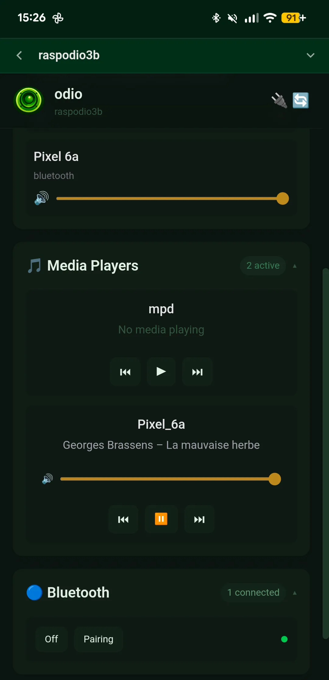 Embedded UI showing a Bluetooth device streaming music — phone appears as a media player and audio client