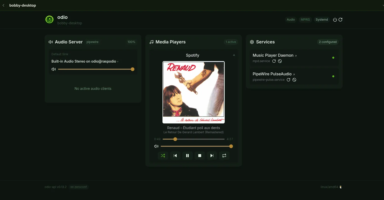 odio UI on the controlling desktop: the Media Players panel shows Spotify with full cover art, track title, artist, album, and transport controls; the Services panel lists MPD and PipeWire PulseAudio