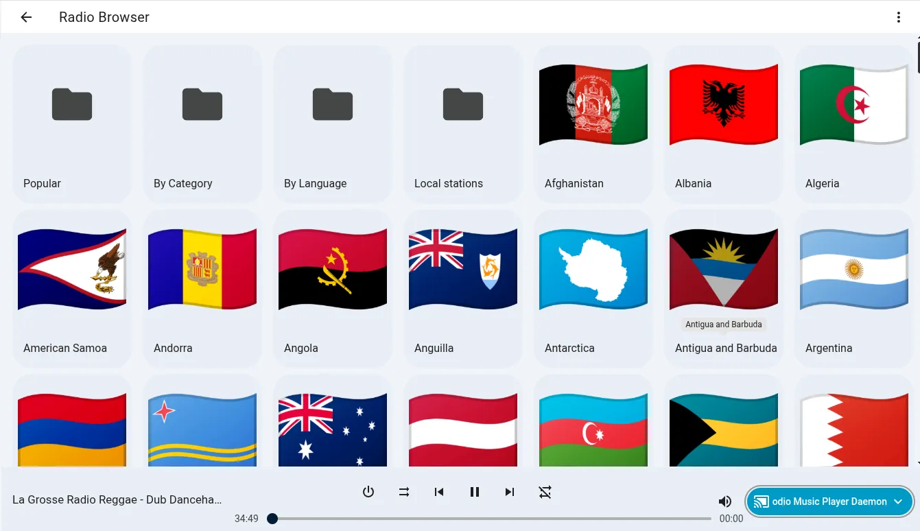 Home Assistant Radio Browser grid view with country flags (Popular, By Category, By Language, Local stations, Afghanistan, Albania, Algeria, Argentina, Australia, Austria), La Grosse Radio Reggae playing in the footer with odio Music Player Daemon as the active output